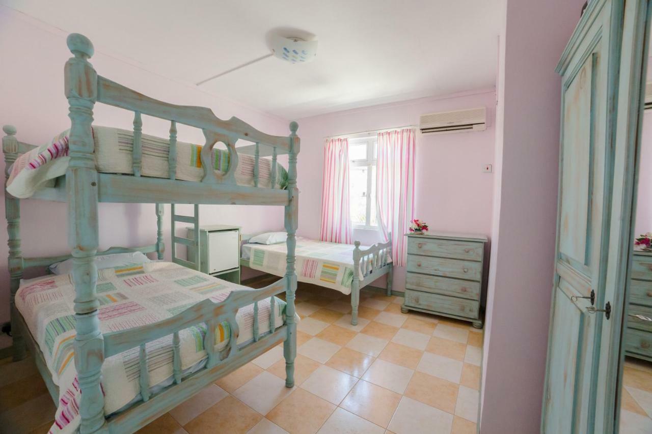 Villa Bella Charming Beachfront Guesthouse Blue Bay Exterior foto