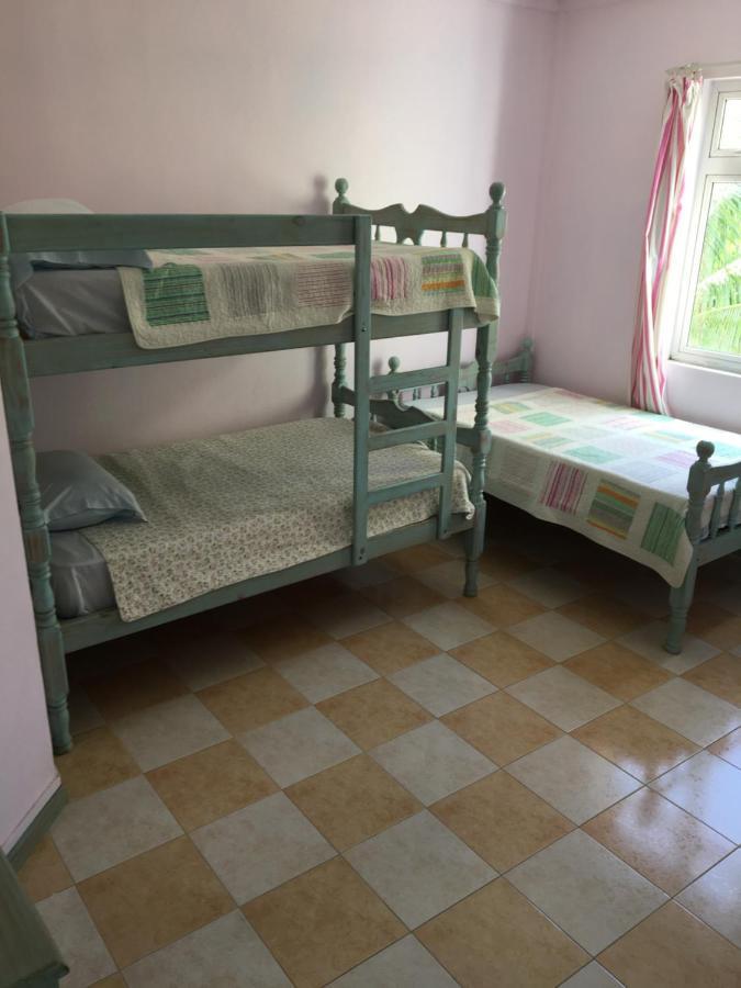 Villa Bella Charming Beachfront Guesthouse Blue Bay Exterior foto